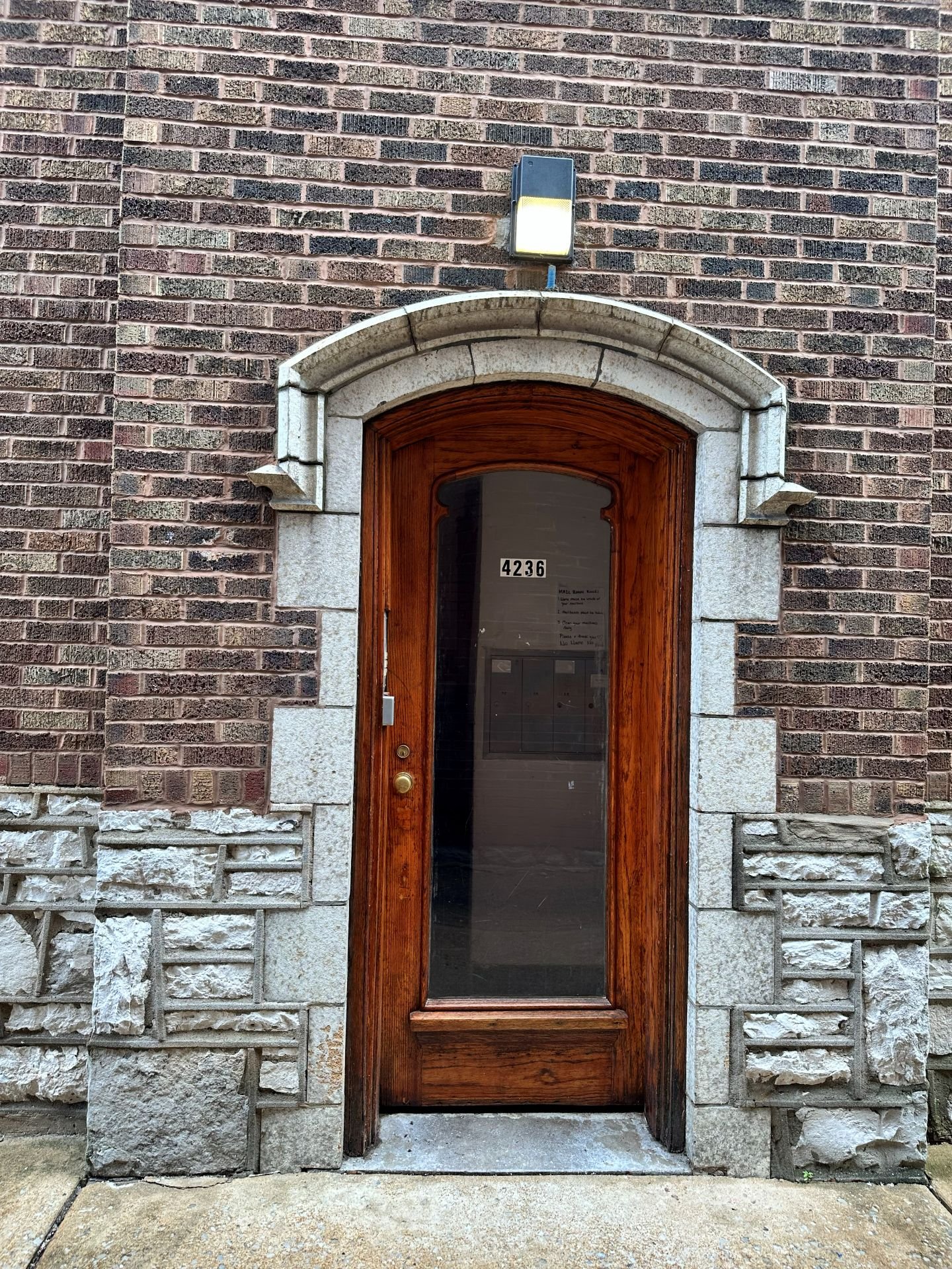 Front entrance door and mailboxes